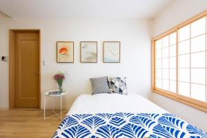 Postel nebo postele na pokoji v ubytování 寅ホテル 台東 Hotel 寅 台东 Tora Hotel Taito D
