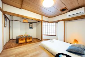 Postel nebo postele na pokoji v ubytování 寅ホテル 台東 Hotel 寅 台东 Tora Hotel Taito D