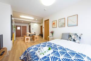 Postel nebo postele na pokoji v ubytování 寅ホテル 台東 Hotel 寅 台东 Tora Hotel Taito D