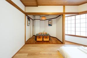 Postel nebo postele na pokoji v ubytování 寅ホテル 台東 Hotel 寅 台东 Tora Hotel Taito D
