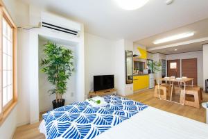 TV a/nebo společenská místnost v ubytování 寅ホテル 台東 Hotel 寅 台东 Tora Hotel Taito D