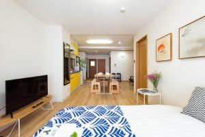 TV a/nebo společenská místnost v ubytování 寅ホテル 台東 Hotel 寅 台东 Tora Hotel Taito D