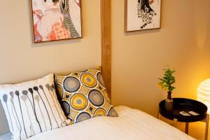 Postel nebo postele na pokoji v ubytování 寅ホテル 台東 Hotel 寅 台东 Tora Hotel Taito D
