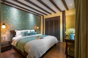 Foto de la galeria de Lijiang Gui Yuan Tian Ju Guesthouse a Lijiang