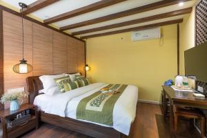 Foto de la galeria de Lijiang Gui Yuan Tian Ju Guesthouse a Lijiang