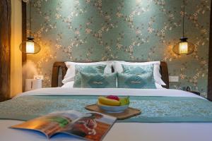Foto de la galeria de Lijiang Gui Yuan Tian Ju Guesthouse a Lijiang