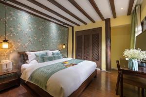 Foto de la galeria de Lijiang Gui Yuan Tian Ju Guesthouse a Lijiang