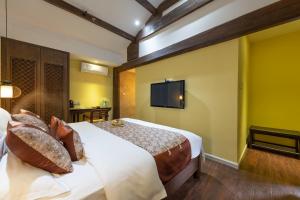 Foto de la galeria de Lijiang Gui Yuan Tian Ju Guesthouse a Lijiang