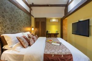 Foto de la galeria de Lijiang Gui Yuan Tian Ju Guesthouse a Lijiang