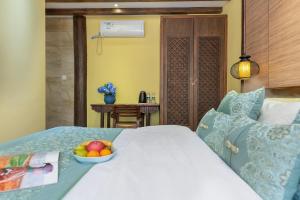 Foto de la galeria de Lijiang Gui Yuan Tian Ju Guesthouse a Lijiang