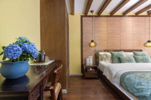 Foto de la galeria de Lijiang Gui Yuan Tian Ju Guesthouse a Lijiang
