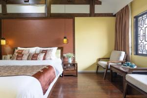 Foto de la galeria de Lijiang Gui Yuan Tian Ju Guesthouse a Lijiang