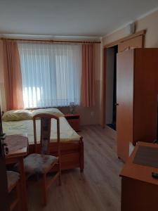 Posteľ alebo postele v izbe v ubytovaní Pokoje Gościnne ASIA