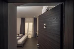 Postel nebo postele na pokoji v ubytování mc b&b