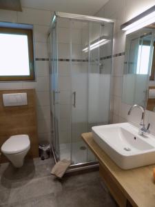 Kúpeľňa v ubytovaní Appartements Obergollerhof
