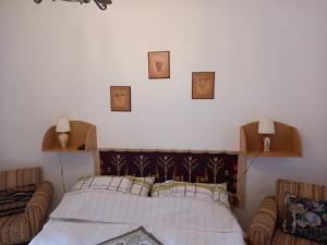 Кровать или кровати в номере Galambos Pincészet