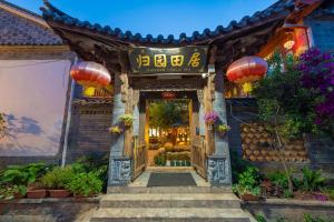 Foto de la galeria de Lijiang Gui Yuan Tian Ju Guesthouse a Lijiang
