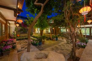 Foto de la galeria de Lijiang Gui Yuan Tian Ju Guesthouse a Lijiang