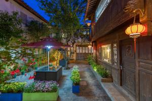 Fotografie z fotogalerie ubytování Lijiang Gui Yuan Tian Ju Guesthouse v destinaci Li-ťiang