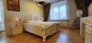 Postel nebo postele na pokoji v ubytování Aparthotel - SAVAS 2 - Cosy House Kaunas & Parking