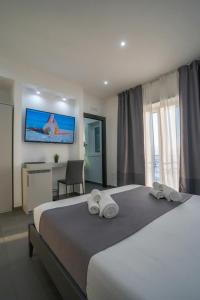 TV a/nebo společenská místnost v ubytování mc b&b