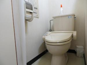 a bathroom with a toilet with a bottle on top of it at Komecho Ryokan / Vacation STAY 33206 in Imabari