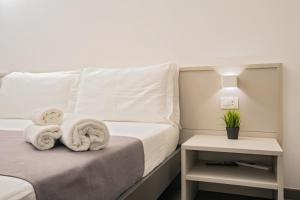 Postel nebo postele na pokoji v ubytování mc b&b