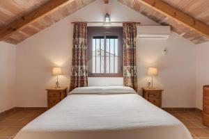 Postel nebo postele na pokoji v ubytování Casa Miguelin + 23 fotografií