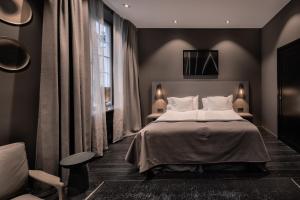 The Lamp Hotel & Spa客房内的一张或多张床位
