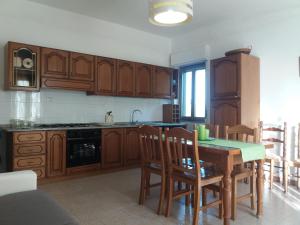 Kuchyň nebo kuchyňský kout v ubytování Casa Fronte Gole Alcantara + 18 fotografií