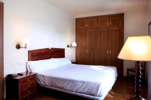 Postel nebo postele na pokoji v ubytování Hostal Antxitonea