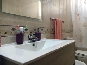 Łazienka w obiekcie APARTAMENTO LA TORNA