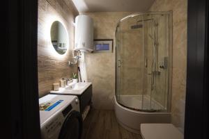 Ένα μπάνιο στο Luxury Apartments Petofi