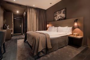 The Lamp Hotel & Spa客房内的一张或多张床位