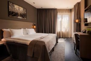 The Lamp Hotel & Spa客房内的一张或多张床位