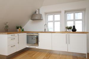 Køkken eller tekøkken på Villa Skansen + 6 billeder