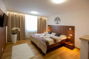 Postel nebo postele na pokoji v ubytování WX Hotel