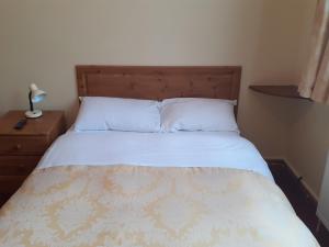 Letto o letti in una camera di Redclyffe Guesthouse