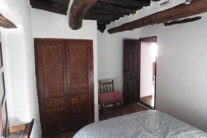 Posteľ alebo postele v izbe v ubytovaní Casa La Soleá. Vistas al pueblo y la Sierra