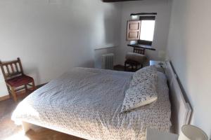 Posteľ alebo postele v izbe v ubytovaní Casa La Soleá. Vistas al pueblo y la Sierra