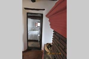 Posteľ alebo postele v izbe v ubytovaní Casa La Soleá. Vistas al pueblo y la Sierra