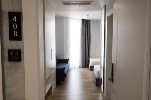 Postel nebo postele na pokoji v ubytování Mirage Hotel