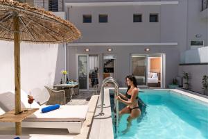 
The swimming pool at or near Delfina Art Hotel
