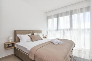 Postel nebo postele na pokoji v ubytování Apartmani Porat