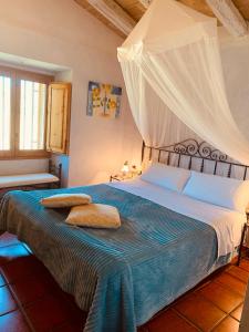 Posteľ alebo postele v izbe v ubytovaní Arianella Holiday Home Penedes