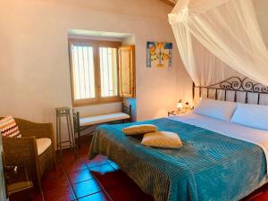 Posteľ alebo postele v izbe v ubytovaní Arianella Holiday Home Penedes