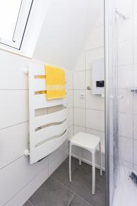 Ein Bett oder Betten in einem Zimmer der Unterkunft Ferienhaus Windspiel