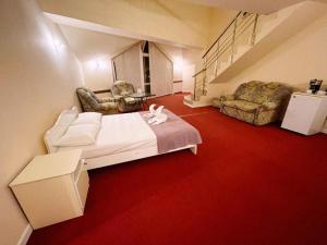 Cama o camas de una habitación en Atlantida Hotel