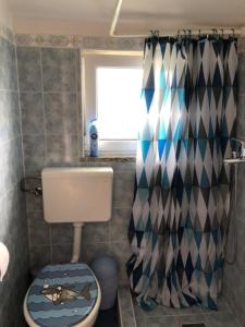 Kúpeľňa v ubytovaní Apartman SARA