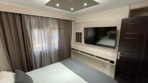TV a/nebo společenská místnost v ubytování luxrooms